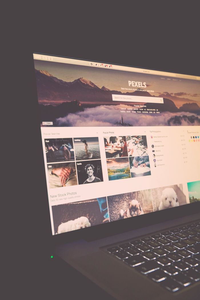 Crafting Captivating Headlines: Your awesome post title goes here Laptop screen showing Pexels website, ideal for stock photo needs.